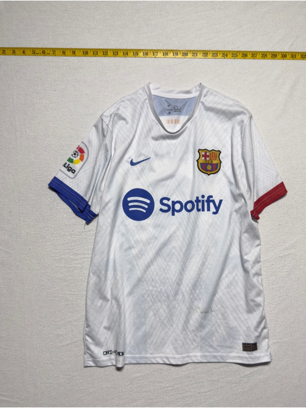 Nike White FC Barcelona Spotify Away Jersey with Blue and Red Accents